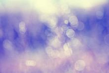 Dreamy Abstract Winter Season Blurred Nature Background. Lovely Blurry Vintage Yellow Purple Bokeh Background.