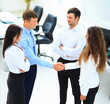 © ASDF - businessman shaking hands to seal a deal with his partner