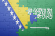 © luzitanija - puzzle with the national flag of saudi arabia and bosnia and herzegovina