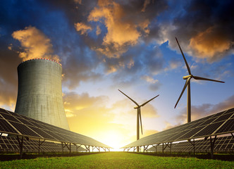 Wall Mural - solar energy panels, wind turbines and nuclear power plant at sunset.