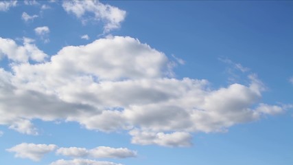 Wall Mural - loop features time lapse motion clouds backed by a beautiful blue sky.