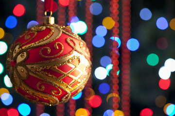 Sticker - Christmas bauble on lighting background