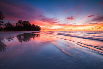 Wall Mural - vibrant sunset skies with reflection