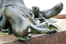 Bronze Feet Of A Statue