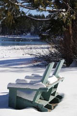 Wall Mural - Nature: Snow - 2 blue chairs in the snow by Lake Tahoe