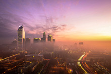 A Foggy And Colorful Sunrise In Charlotte, North Carolina During The Morning Rush Hour Traffic. 