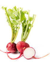 Sliced fresh red radish on white