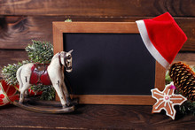 Blackboard With Space For Own Text And Christmas Decorations