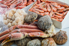 Frozen Shells Of Scallops, Shrimps , Crabs In A Package