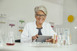 © Westend61 - Portrait of smiling female scientist in lab