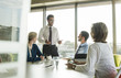 © Westend61 - Businessman having a presentation in conference room