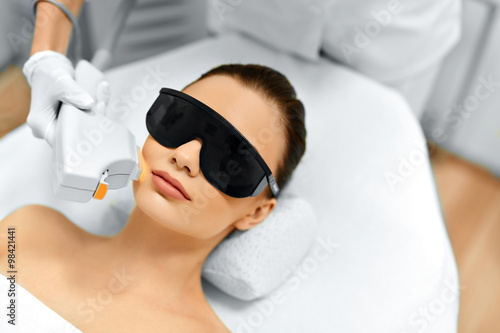 Valokuvatapetti Skin Care. Face Beauty Treatment. IPL. Photo Facial Therapy. Ant