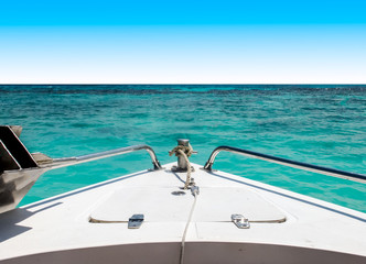 Start Journey to The Sea Concept, View of Speed Boat Moving with Seascape and Clear Sky in Background