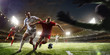 Leinwandbild Motiv Soccer players in action on sunset stadium background panorama