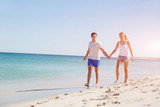 Fototapeta  - Romantic young couple on the beach