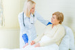 © zinkevych - Professional nurse taking care of a patient