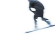 © checubus - a man skiing snow board very fast. blurred picture.