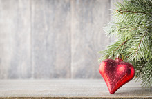 Christmas Fir Branch And Decor, On The Wooden Background.