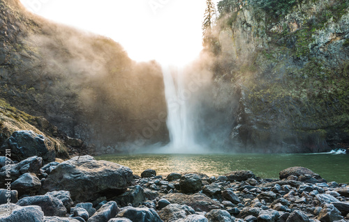 Fotografie, Obraz scenic view of Snoqualmie falls with golden fog when sunrise in winter season,Washington,USA