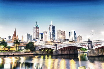 Canvas Print - Stunning night skyline of Melbourne with river reflections