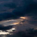 Fototapeta Na sufit - twilight sunset sky with cloudy and sunlight through clouds