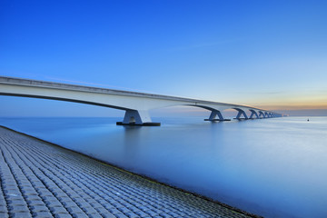 Wall Mural - The Zeeland Bridge in Zeeland, The Netherlands at dawn