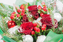Close-up Of Christmas Bouquet With Flowers And Spruce With Snow.