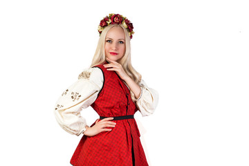 Wall Mural - Girl in Ukrainian national traditional costume and chaplet