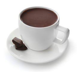 White cup of cacao with chocolate, isolated on white