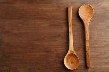 Two wooden spoons on the table, close-up