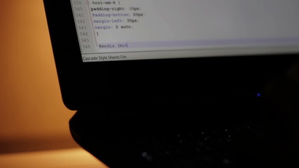 Input Code on the screen of the laptop in the dark