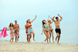 © Africa Studio - Beautiful young people having fun on beach