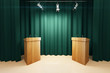 Wooden tribunes on the stage with green scenes and spotlights