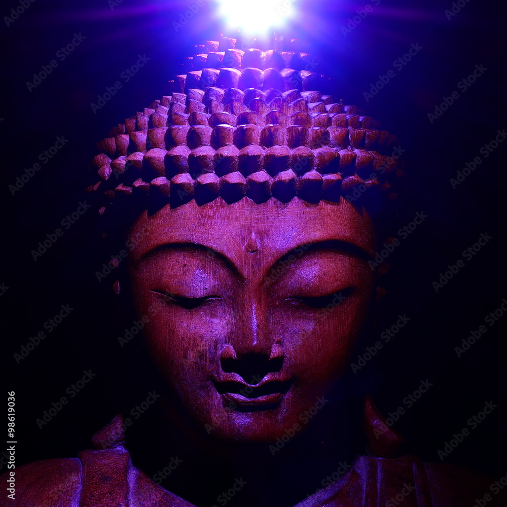 Photo Buddha face with light