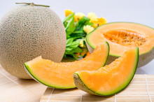 Cantaloupe Melon On The Wooden Table