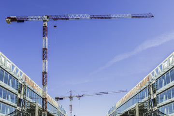 two cranes on a new construction