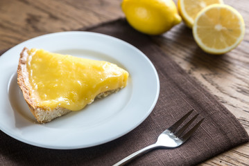 Poster - Slice of lemon tart on the plate