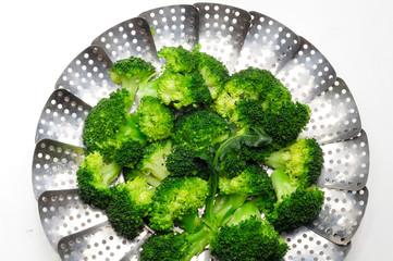 Wall Mural - Broccoli on stainless steel steamer.