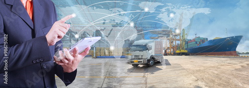 Fotomural hand presses on world map with digital tablet,Industrial Container Cargo freight
