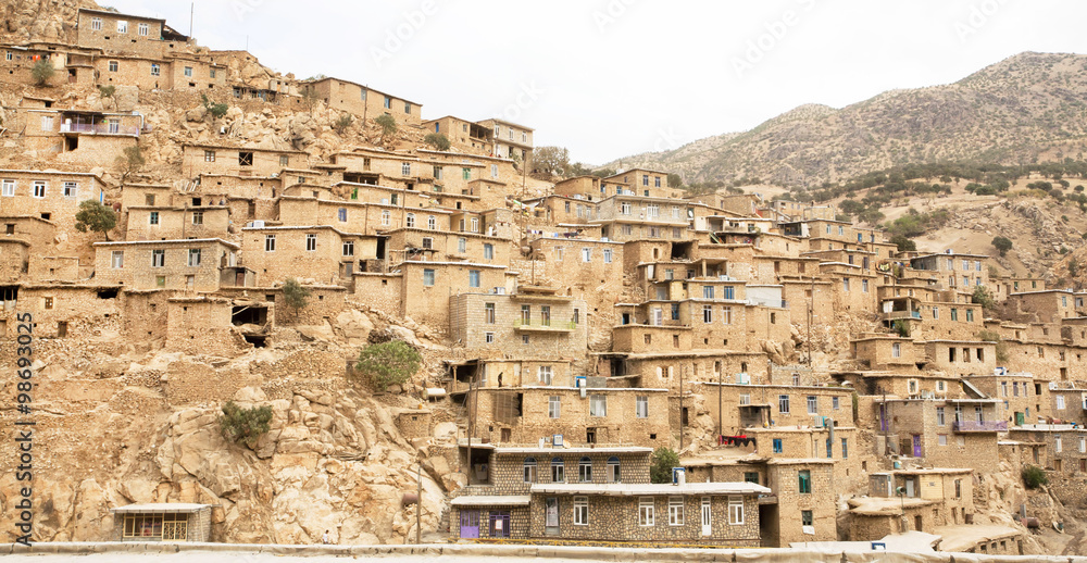 Rural landscape with clay and brick houses in mountain village, Iran ...