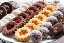 Mixed Christmas Cookies On A White Plate.