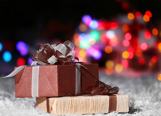 Beautiful gift boxes on the floor, close up