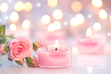Valentine's Day. Pink Heart Shaped Candles And Rose Flowers