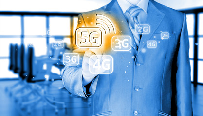 businessman holding in hand 5G, technology background