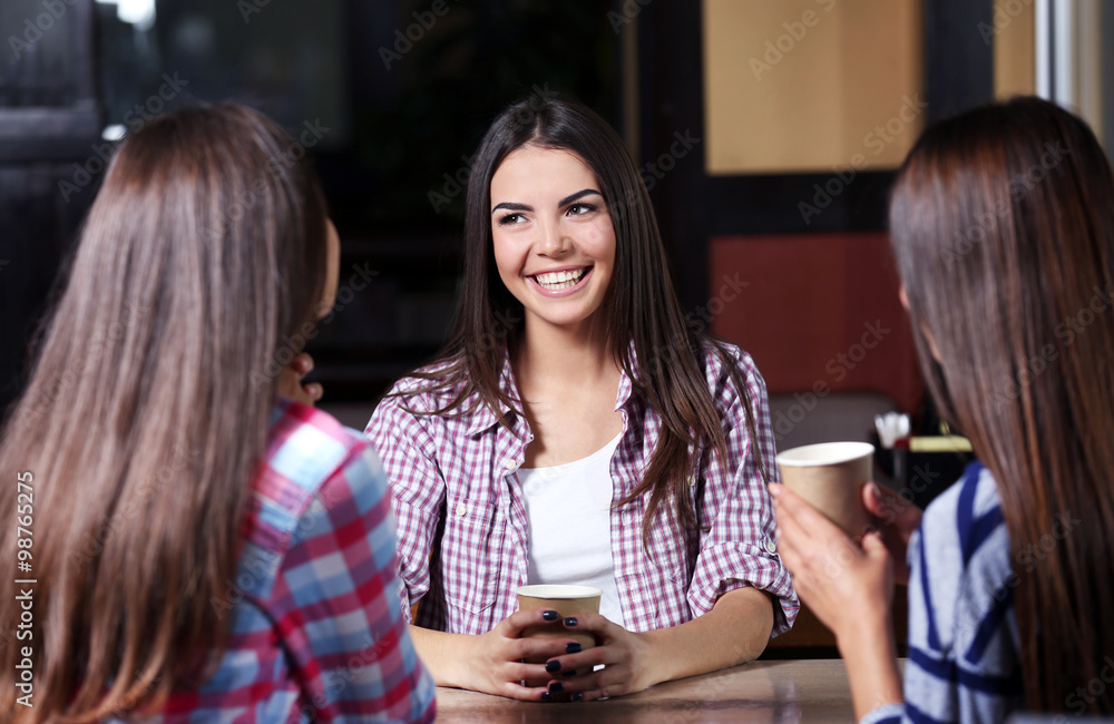 Beautiful girls in cafe