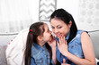 © Africa Studio - Mother and daughter on the sofa