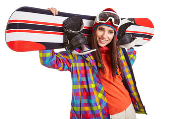 Wall Mural - model wearing snoboard suit holding a snowboard in studio