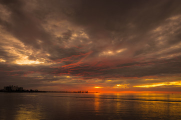 Wall Mural - Dramatic cloudy landscape at the beach