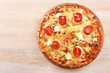 © Africa Studio - Delicious tasty pizza on wooden table