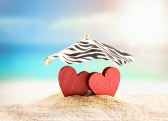 Two hearts on the summer beach